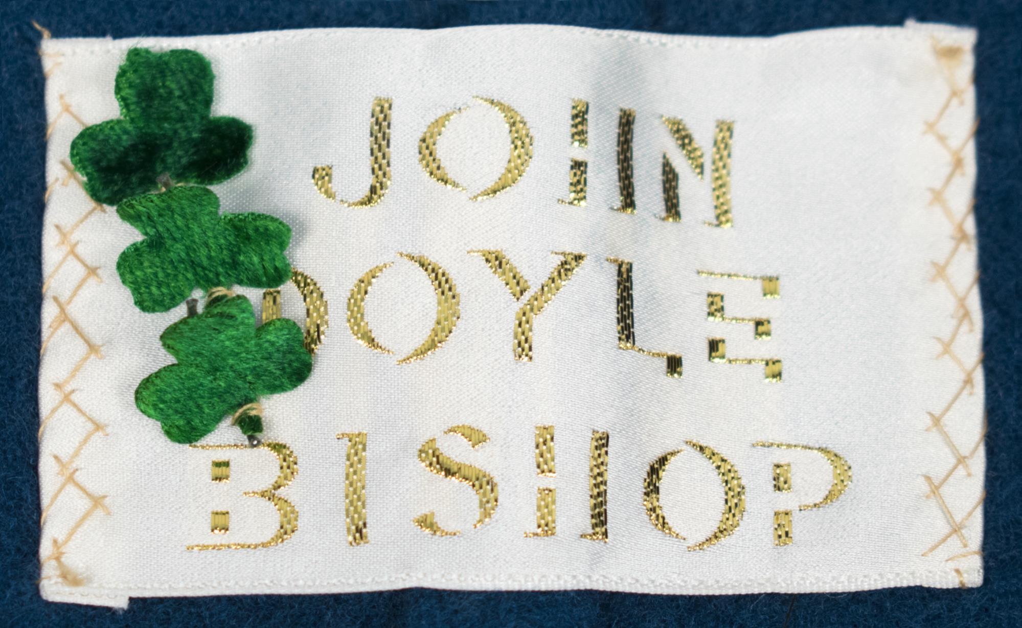 Image of Blue overcoat with cape worn by John Doyle Bishop, ca. 1970
